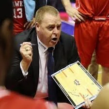Rob Beveridge coaching with whiteboard during timeout